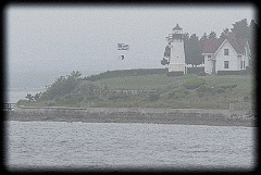 Fogg Rolls In Around Warwick Harbor Light